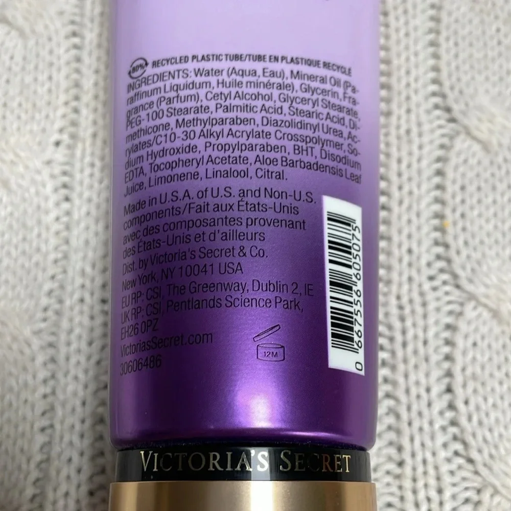 NWOT Victoria Secret Love Spell Body Lotion. 8oz. Purple tube cherry/peach smell